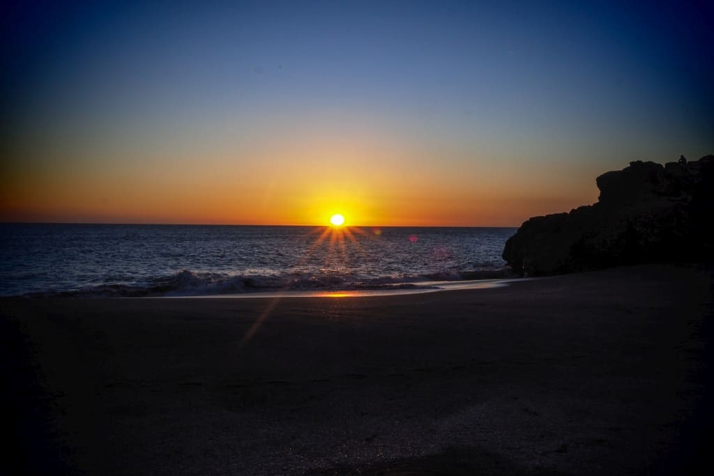 zachod-slonca-na-plazy-Las-Penitas.a